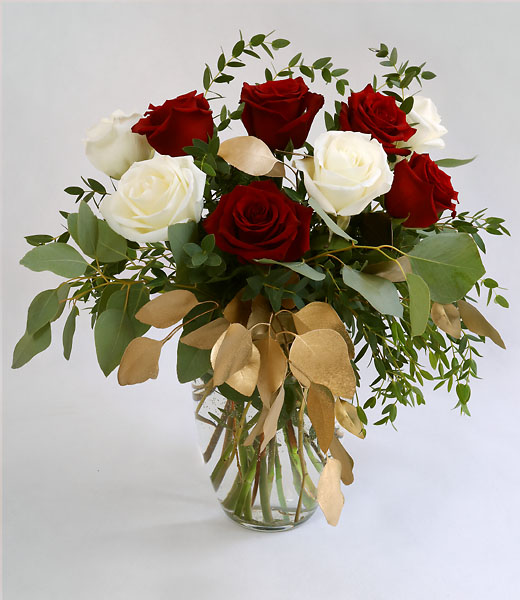 photo of christmas flowers in a vase